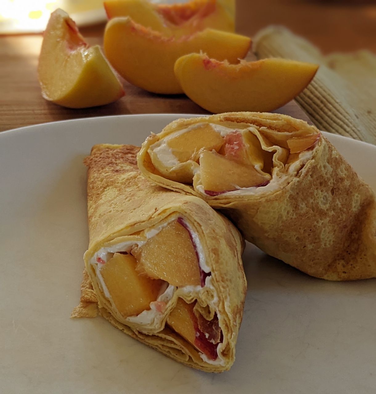 Cream cheese and peach crepes